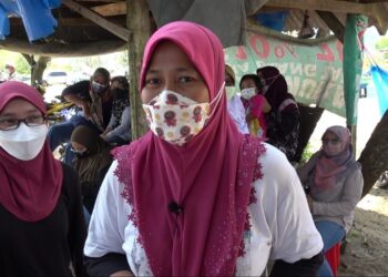 NURUL ASYIKIN Mohamed ketika ditemui di pantai Kampung Baru Beserah di Kuantan, Pahang. - FOTO/DIANA SURYA ABD WAHAB