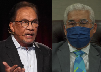 ANWAR IBRAHIM (kiri) dan HASSAN ABDUL KARIM