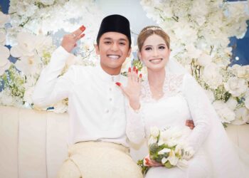 AIMAN Tino melangsungkan perkahwinan dengan Che Syarah Haifa 
Che Isa, baru-baru ini. – UTUSAN/ MUHAMAD IQBAL ROSLI