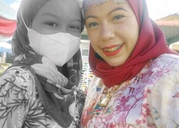 GAMBAR kenangan Misha Kasih Abdullah (kiri) bersama Norbaizura Abu Bakar.