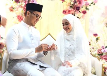 NUR Dhabitah Sabri (kanan) dan Jiggy Masin selamat diijab kabul dalam satu majlis tertutup, Jumaat lalu.