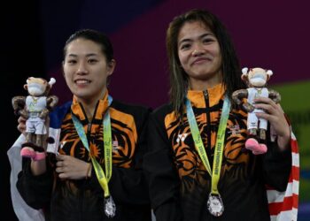 Nur Dhabitah dan Wendy Yan Yee memenangi perak di Sukan Komanwel Birmingham 2022.-AFP