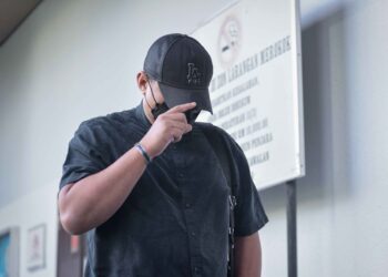 WAN Mohammad Ashraf Nasjaruddin tiba di Mahkamah Sesyen Kuala Lumpur bagi sebutan kes melakukan seks menggunakan objek ke atas seorang pegawai bank. -  UTUSAN/MOHD. FIRDAUS MOHD. JOHARI