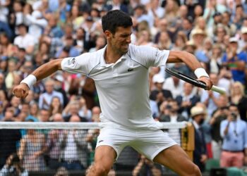 REAKSI Novak Djokovic sejurus menumpaskan Denis Shapovalov untuk melangkah ke final Wimbledon hari ini. - AFP