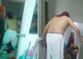 TANGKAP layar kejadian seorang lelaki memukul isterinya dalam kejadian di sebuah kondominium di Cheras. - MEDIA SOSIAL