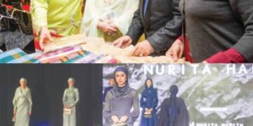 Raja Permaisuri Agong, Tunku Hajah Azizah Aminah Maimunah Iskandariah berkenan mendengar penerangan daripada Tengku Muhaini dan Raja Rezza Shah (dua dari kanan), ketika melawat ruang pameran pada Majlis Malam Amal Bakasa dan Bakat Festival Fesyen Islamik (IFF) 2022 di Wisma Perwira, baru-baru ini.