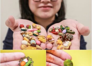 Ling Hooi Yin menunjukkan sebahagian daripada miniatur makanan hasil kreativitinya.