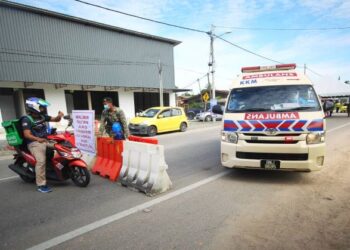 KAMPUNG Kutan Tengah dikenakan PKPD sehingga 24 Jun depan kini dikawal ketat anggota pasukan keselamatan. - UTUSAN/ZULHANIFA SIDEK