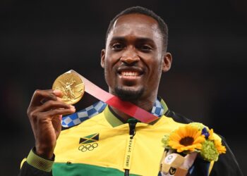 Hansle Parchment  mungkin tidak akan memenangi pingat emas 110m Olimpik jika tidak mendapat bantuan daripada gadis sukarelawan bernama Trijana.