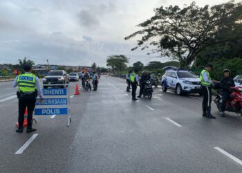 OPERASI mengesan kesalahan lalu lintas di Kilometer 3, Jalan Kota Tinggi - Kluang yang dilakukan anggota polis Kota Tinggi dalam Op Selamat ke-19 sempena sambutan Tahun Baharu Cina.