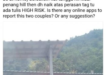 GAMBAR tular pasangan memakai gelang merah jambu di sebuah kawasan tempat meletak kereta berhampiran rumah ibadat di Bukit Bendera, Pulau Pinang.