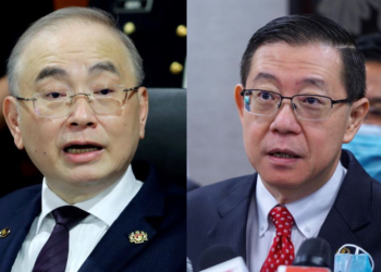 WEE Ka Siong (kiri) dan Lim Guan Eng menghangatkan Dewan Rakyat apabila Menteri Pengangkutan itu mencabar Setiausaha Agung DAP untuk berdebat dalam isu dasar kabotaj negara.