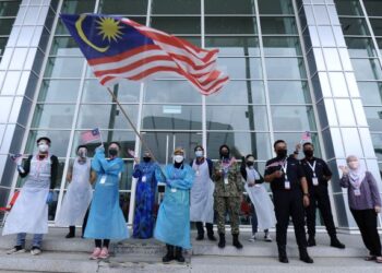 PERJUANGANmembebaskan diri daripada pandemik merupakan tanggungjawab bersama setiap rakyat. – UTUSAN/FAIZ ALIF 
AHMAD ZUBIR