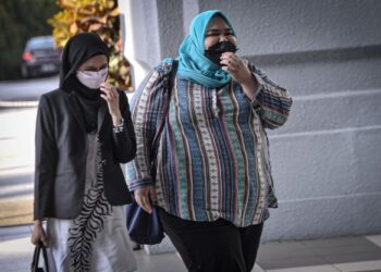 SITI Bainun Ahd Razali hadir di Kompleks Mahkamah Kuala Lumpur di sini, hari ini bagi menghadiri sambung bicara pertuduhan yang dihadapinya melibatkan pengabaian seorang remaja perempuan Sindrom Down berusia 13 tahun. -UTUSAN/FAIZ ALIF AHMAD
