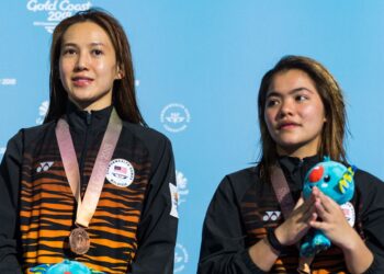 LEONG MUN YEE (kiri) dan Pandalela Rinong memenangi pingat gangsa dalam Sukan Komanwel Gold Coast 2018. - AFP