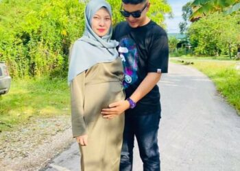GAMBAR kenangan Mohd. Aiman Syakir bersama arwah isterinya, Izzati Najah Amran.
