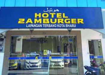 BANGUNAN Hotel Zamburger yang terletak di hadapan Lapangan Terbang Sultan Ismail Petra (LSTIP), Pengkalan Chepa yang didakwa akan dilelong bermula 31 Mei ini. - IHSAN MEDIA SOSIAL