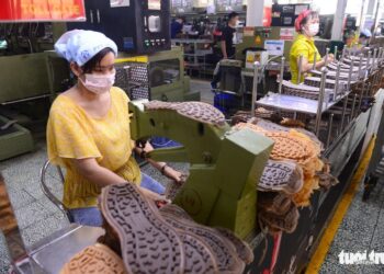 PouYuen antara firma terbesar di ibu kota itu, dianggarkan mempunyai 50,000 pekerja. - AGENSI
