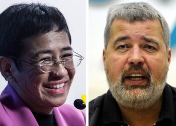 MARIA RESSA (kiri) dan Dmitry Muratov. - AFP