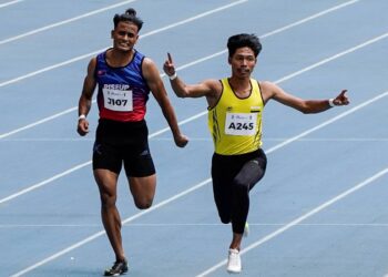 Muhammad Azeem Mohd Fahmi (kanan) dari Perak muncul juara acara 100m pada Sukan Malaysia (SUKMA) ke-20 yang berlangsung di Stadium Nasional Bukit Jalil.UTUSAN/AMIR KHALID