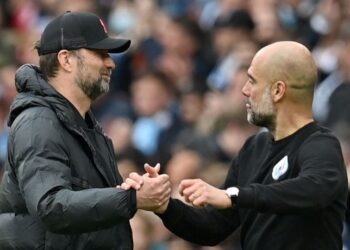 PEP Guardiola (kanan) dan Jurgen Klopp saling bersaing hebat.