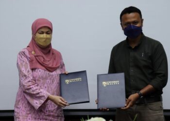 Shaliza bersama Jamalee ketika majlis memeterai perjanjian di UM baru-baru ini.