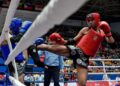 AHMAD Nor Iman Aliff (kanan) mengasak Huynh Hoang Phi dalam pertarungan 54kg muay thai pada Sukan SEA Vietnam 2021 lalu.