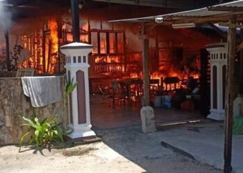 SEBUAH daripada enam rumah yang terbakar dalam kejadian di Kampung Dalam Rhu, Tumpat, Kelantan, hari ini. - IHSAN JBPM