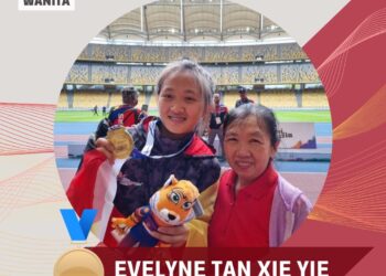Evelyn Tan Xie Yie merangkul pingat emas lompat galah Sukma edisi ke-20.