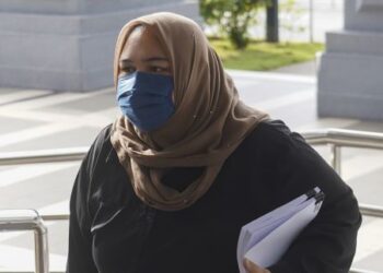 SITI Bainun Ahd Razali hadir ke Mahkamah Sesyen Kuala Lumpur bagi perbicaraan peringkat bela diri di dalam kes mengabai dan menganiaya seorang remaja Sindrom Down. - FOTO/SHIDDIEQIIN ZON