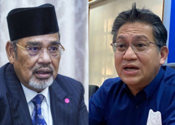 TAJUDDIN ABDUL RAHMAN (kiri) dan NUR JAZLAM MOHAMED