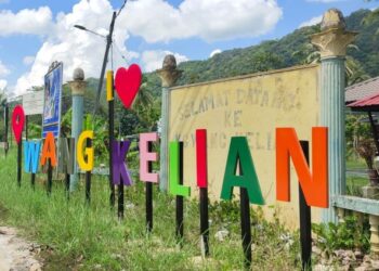 PAPAN tanda perkampungan Wang Kelian, Padang Besar, Perlis. - UTUSAN/SYED AZLAN HIZAR