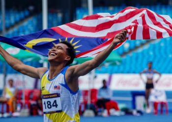 UMAR Osman memberi keceriaan kepada kem olahraga dengan memecah rekod kebangsaan berusia 22 tahun ketika memenangi pingat emas 400 mete lelaki di Phnom Penh. - MINGGUAN