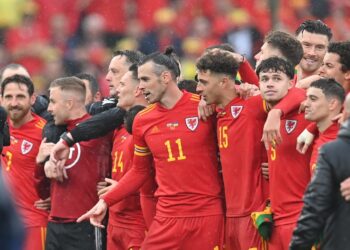 Jaringan tunggal Gareth Bale bantu Wales layak ke Piala Dunia selepas 64 tahun.-AFP