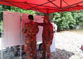 POS kawalan di tempat kejadian untuk mencari mangsa yang hilang ketika memukat ikan di Sungai Rui di Kampung Alai dekat Gerik semalam. - UTUSAN/IHSAN JBPM