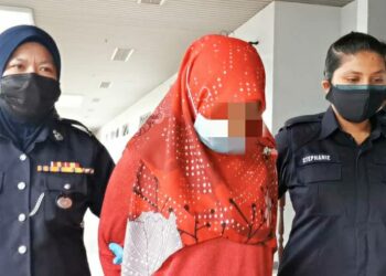 NUR ANATI Kamarudin didenda RM2,000 selepas didapati bersalah memuat naik satu kenyataan tidak benar mengenai Covid-19 di Mahkamah Sesyen, Ayer Keroh, Melaka. - UTUSAN/DIYANATUL ATIQAH ZAKARYA