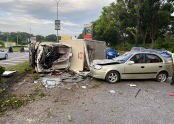 NAHAS membabitkan dua buah kenderaan di Jalan Persiaran Negeri, Nilai, Seremban, petang tadi. - GAMBAR IHSAN POLIS