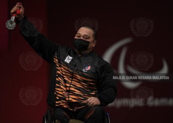 Malaysia memenangi pingat kedua dalam Sukan Paralimpik Tokyo 2020 selepas Jong Yee Khie meraih perak acara powerlifting 107kg lelaki, semalam.- IHSAN FACEBOOK NAJIB RAZAK