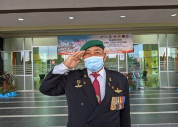 MD. Deka lahir pada 31 Ogos 1957, merupakan seorang pesara komando ketika ditemui pada sambutan Hari Kebangsaan 2021 peringkat daerah Perak Tengah di Parit. - UTUSAN/MOHAMAD HAFIZI MOHD SAID