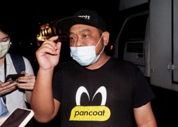 MOHD. Kamal Hamdi ditemui pemberita di lokasi tanah runtuh di Jalan Simpang Pulai- Cameron Highlands hari ini. - UTUSAN/ZULFACHRI ZULKIFLI