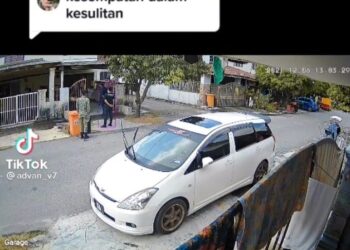 TANGKAP layar rakaman video suspek memaki hamun dan memarahi polis tular di aplikasi TikTok yang berlaku di di Taman Dengkil Jaya, Dengkil, Selangor.