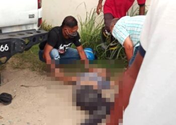 KEADAAN mekanik yang terlibat kemalangan di Jalan Bota Kiri - Tanjung Belanja dekat Parit semalam sebelum kemudiannya disahkan meninggal dunia. - UTUSAN/MEDIA SOSIAL