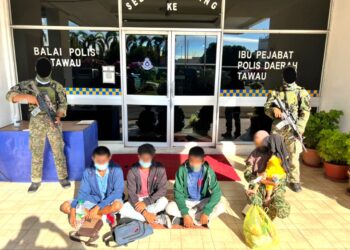 LIMA pendatang asing tanpa izin warga Indonesia yang ditahan di Kampung Kurnia Jaya, Tawau semalam. - IHSAN ATB 2