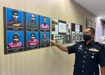 AIBEE Ab. Ghani menunjukkan gambar enam individu yang ditahan berkaitan penipuan urusan jual beli telefon bimbit.
