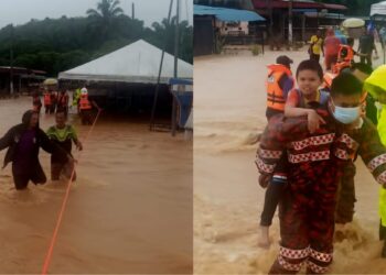 ANGGOTA bomba dan beberapa agensi lain membantu memindahkan mangsa yang terjejas banjir kilat di Taman Seri Kenaboi, Titi Jelebu petang tadi.- GAMBAR/IHSAN BOMBA