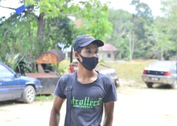 MOHAMAD IKMAL HASBULLAH Arifin ketika ditemui di Kampung Gelugor di Kuantan, Pahang. - UTUSAN/SHAIKH AHAMD RAZIF