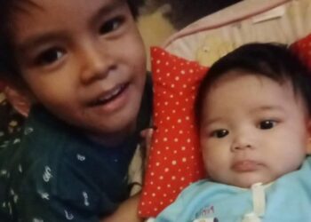 MUHAMMAD Fahmi Mohd. Fazlan dan adiknya, Nor Fahmia berusia enam tahun yang maut dalam kebakaran rumah kedai di Seri Iskandar di Parit hari ini.