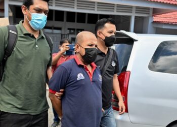 AZIZ Said dihadapkan ke Mahkamah Majistret Marang atas tiga pertuduhan mengedar dan menagih dadah di Marang, hari ini. - PUQTRA HAIRRY ROSLI