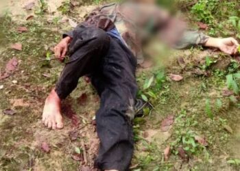 KEADAAN mangsa yang terbaring selepas tertembak dir sendiri di dusun durian di Kampung Kongsi Dalam, Sungai Kob Karangan.