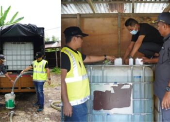 PEGAWAI penguat kuasa KPDNHEP Negeri Sembilan memeriksa hos yang digunakan untuk menyalurkan minyak diesel bersubsidi keluar dari tangki petak di atas lori ke dalam tangki petak di dalam stor haram pada serbuan di Kampung Tan Sri Mohd Said, Jalan Labu, dekat Seremban, hari ini.